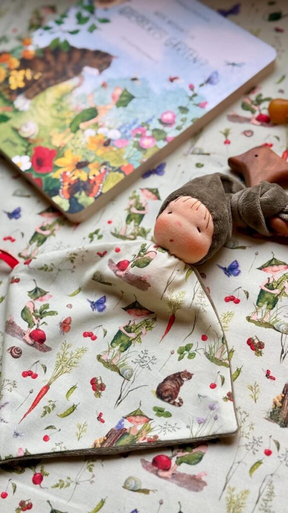 6.1K views · 10K reactions | We are so thankful for  your love and appreciation for our fabrics and my tutorials❤️ First doll with Giesbert’s fabric- custom made of course 🥰 In case you want to make your own one- pattern & tutorial is very beginner friendly with many pictures of each and every single step. This doll has a long cape- so you can easily attach a teething toy or a pacifier to it- no lost items anymore 😉 All supplies are available in our shop too😉 __________ #dollbelge  #waldorf  #waldorfinspired  #tutorial  #sewingforkids | Viktoriya Dollbelge | Facebook